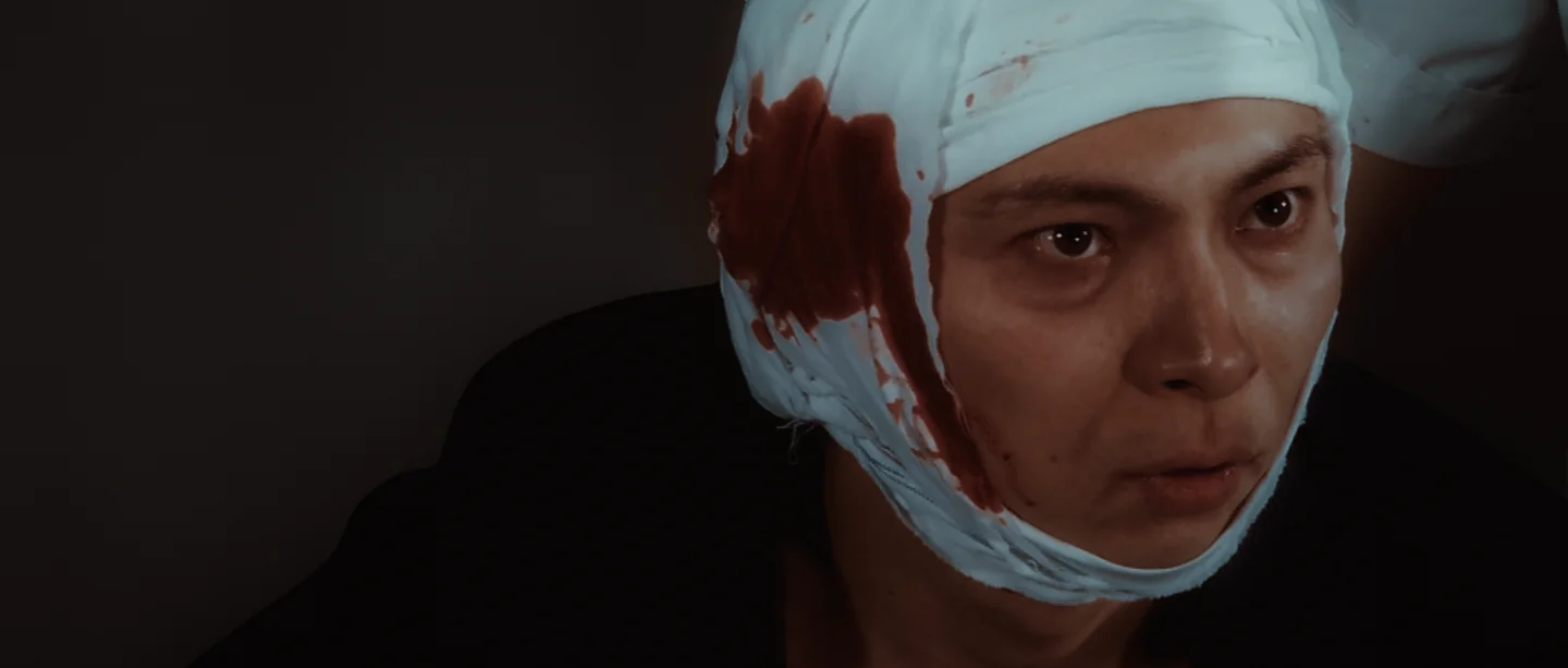 Close-up of wounded Takashi